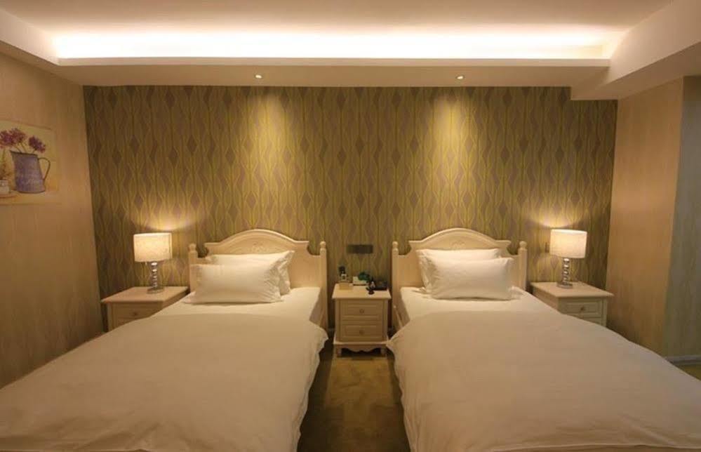 Luoyang Mubin Business Hotel Gucheng  Esterno foto